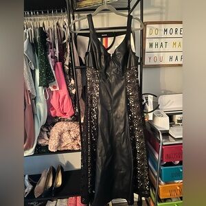 Anthropologie Black leather dress with nude and lace overlay on sides